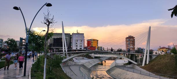 Modern apartment buildings and houses in Shkodër  showcasing beautiful real estate properties