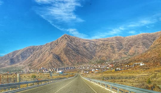 Modern apartment buildings and houses in Bulqizë  showcasing beautiful real estate properties