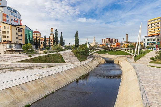 Panoramic view of Fier showcasing modern urban living and real estate opportunities