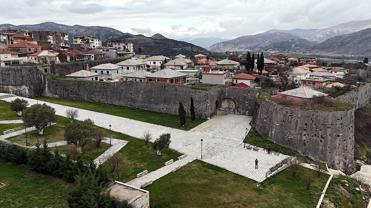 Modern apartment buildings and houses in Tepelena  showcasing beautiful real estate properties