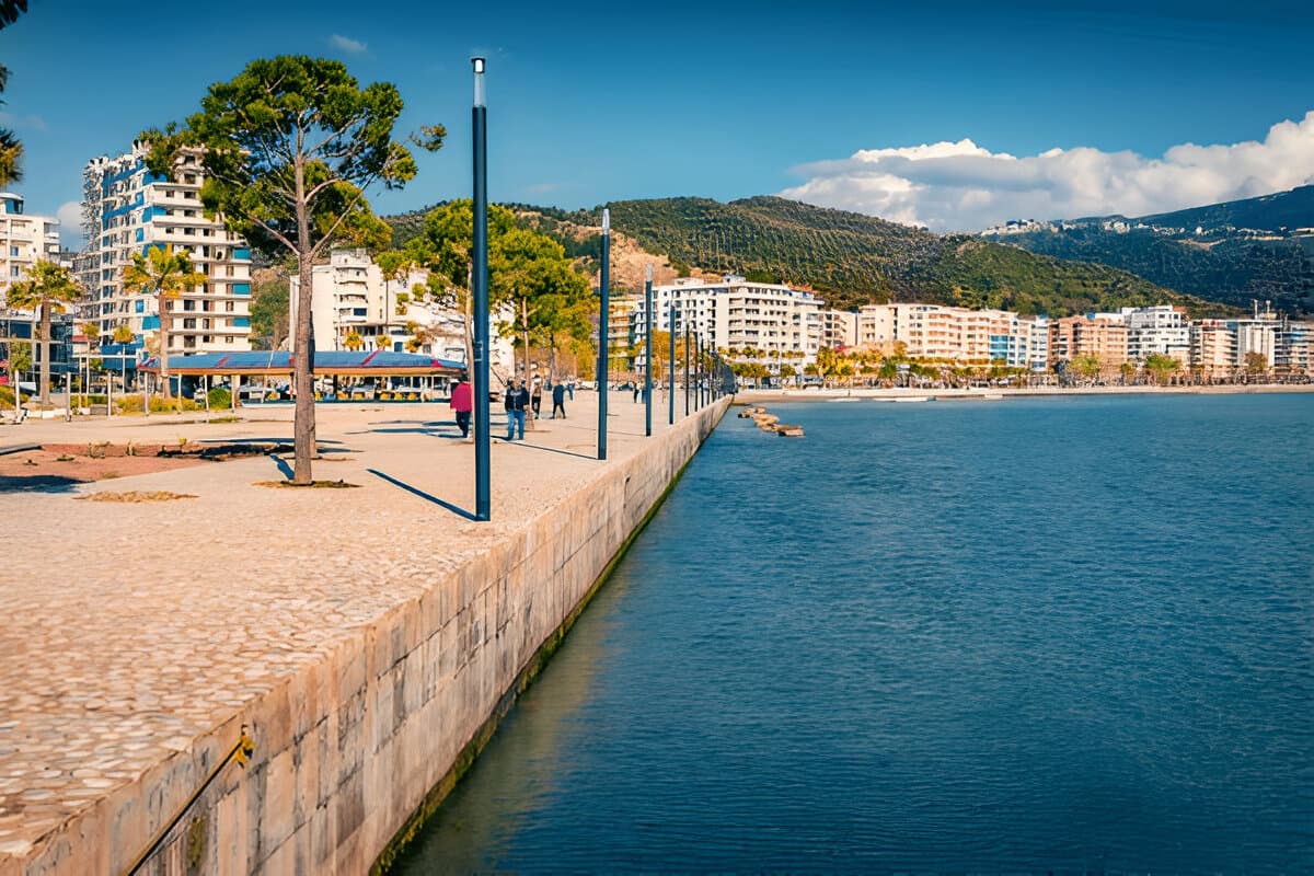 Modern apartment buildings and houses in Vlorë showcasing beautiful real estate properties