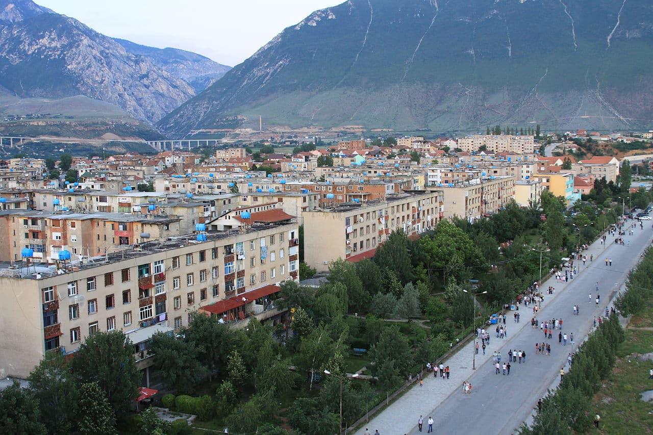 Modern apartment buildings and houses in Kukës showcasing beautiful real estate properties