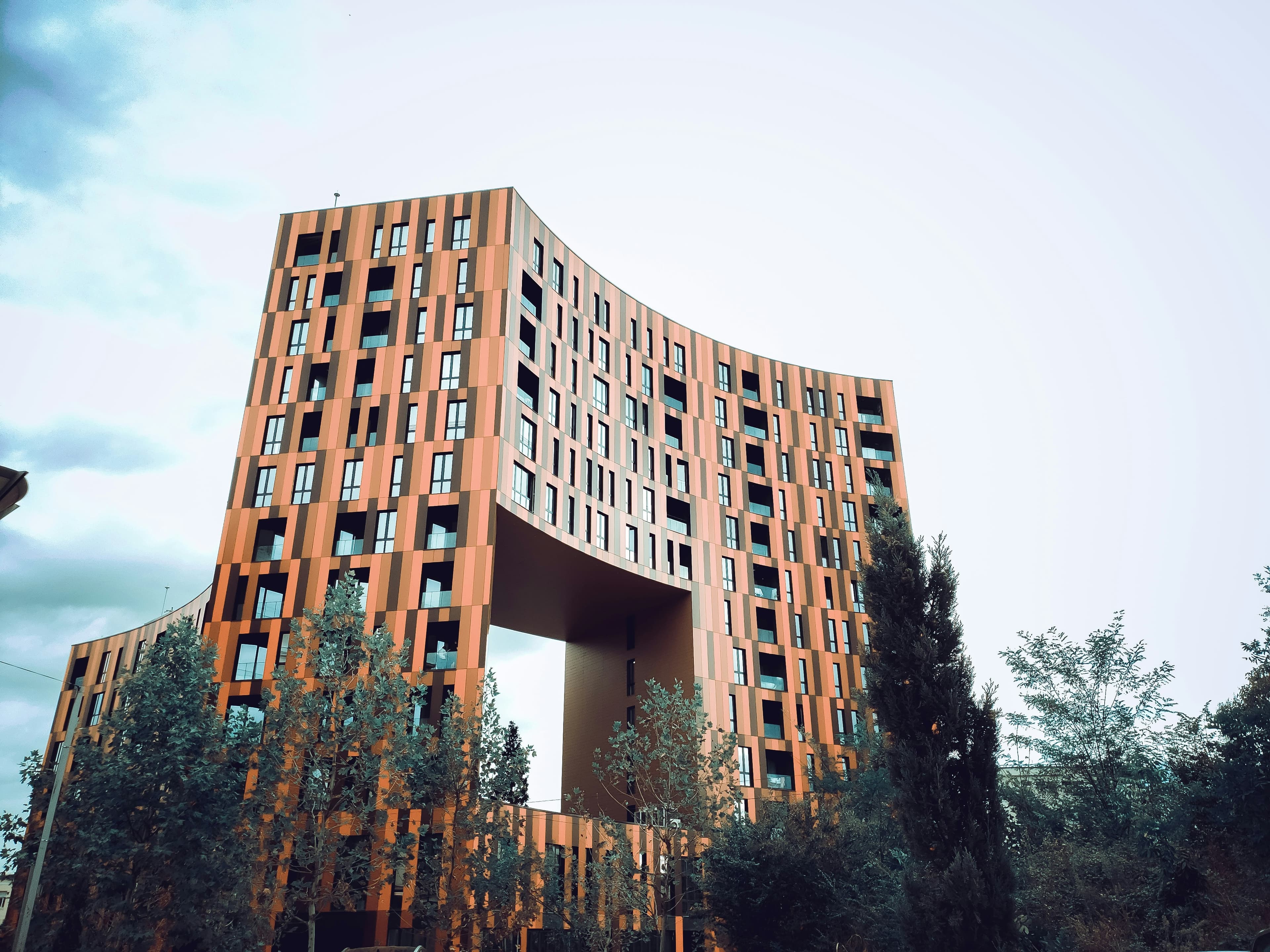 Modern apartment buildings and houses in Tirana showcasing beautiful real estate properties