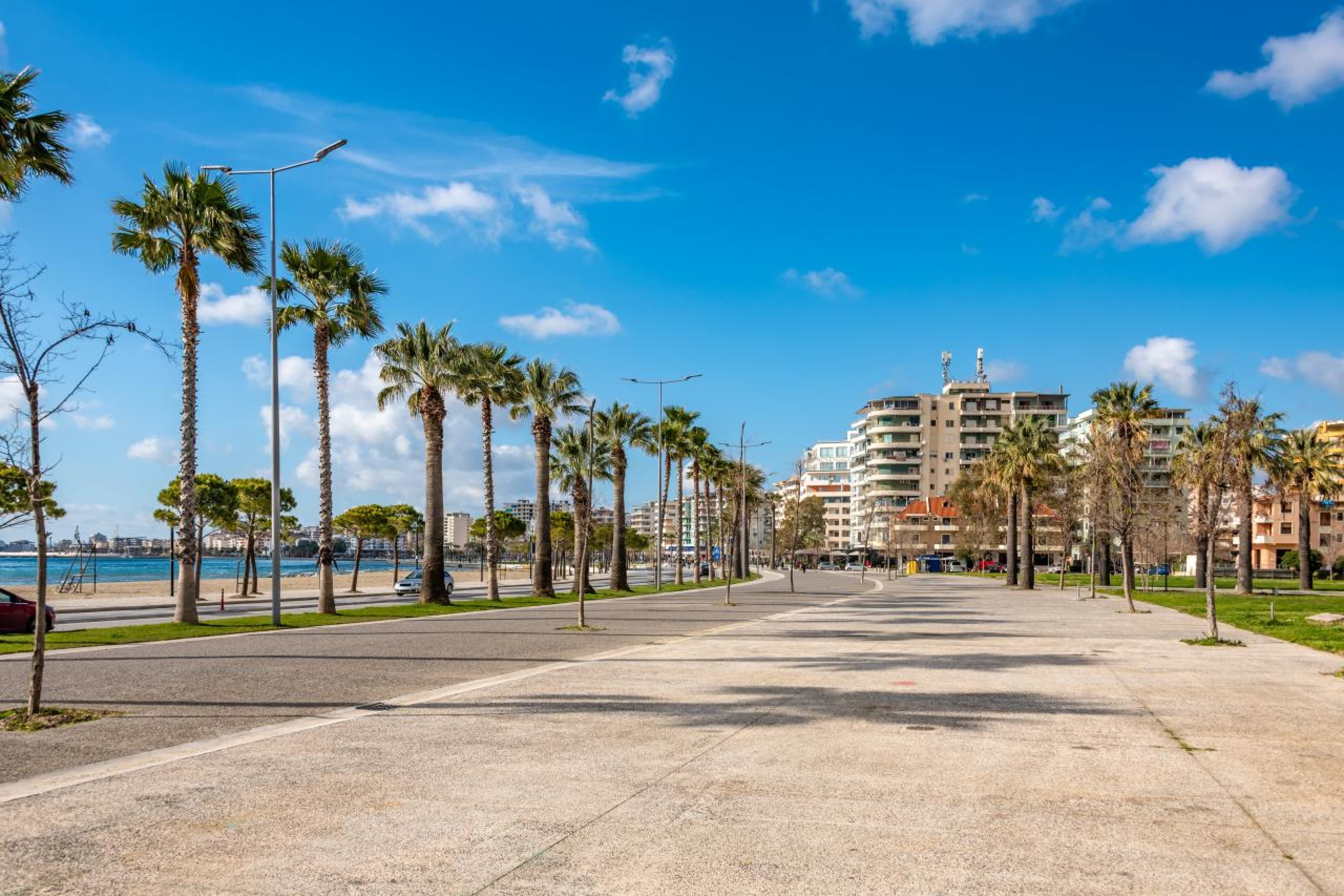 Modern apartment buildings and houses in Vlorë showcasing beautiful real estate properties