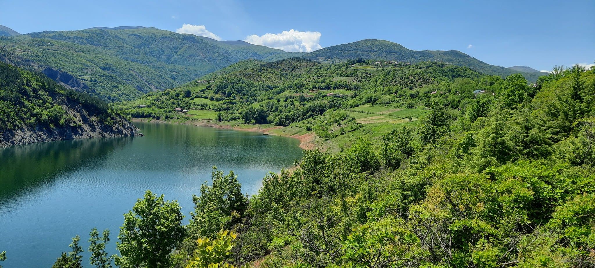 Modern apartment buildings and houses in Fushë-Arrëz showcasing beautiful real estate properties