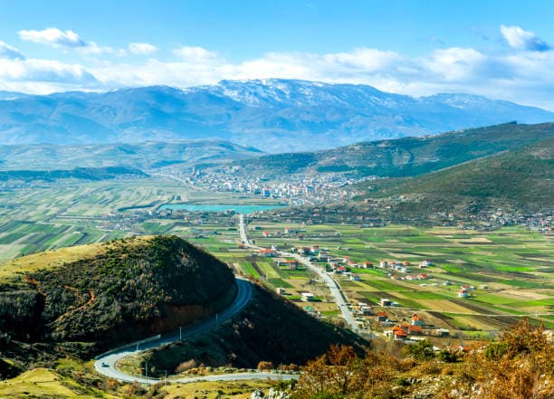 Modern apartment buildings and houses in Elbasan  showcasing beautiful real estate properties