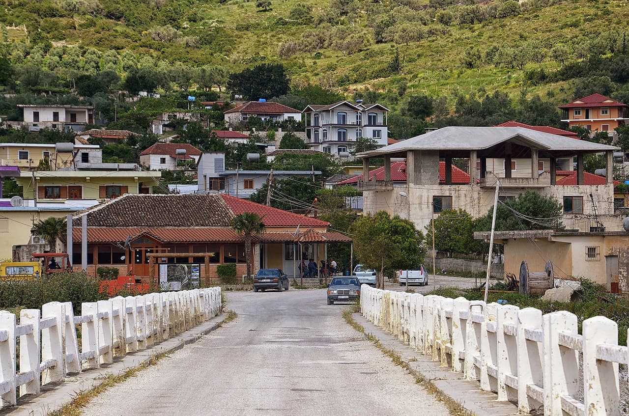 Modern apartment buildings and houses in Selenicë  showcasing beautiful real estate properties