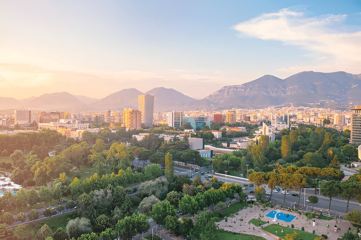 Modern apartment buildings and houses in Tirana showcasing beautiful real estate properties