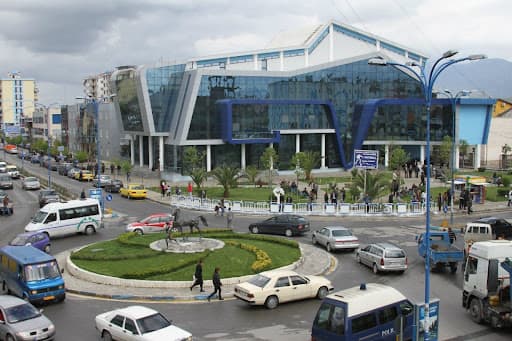 Modern apartment buildings and houses in Kamëz  showcasing beautiful real estate properties